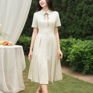 Đầm xòe cộc tay trang trí nơ cổ